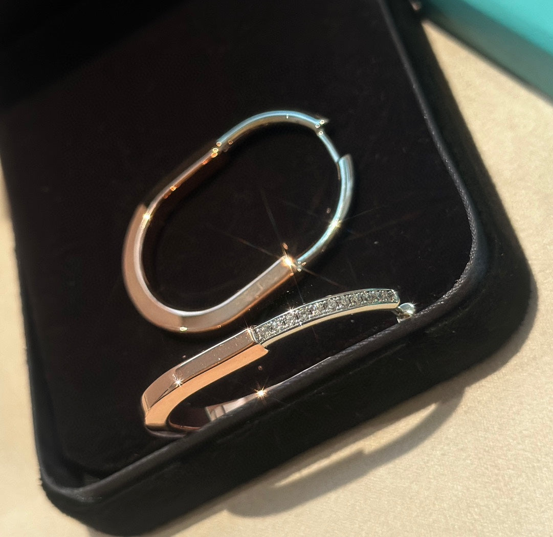 18K Tiffany Lock Diamond Earrings