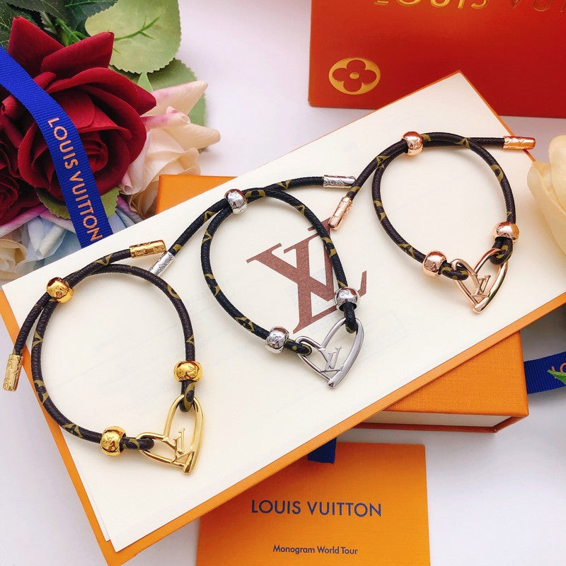 18K Louis Vuitton Heart Charm Bracelet