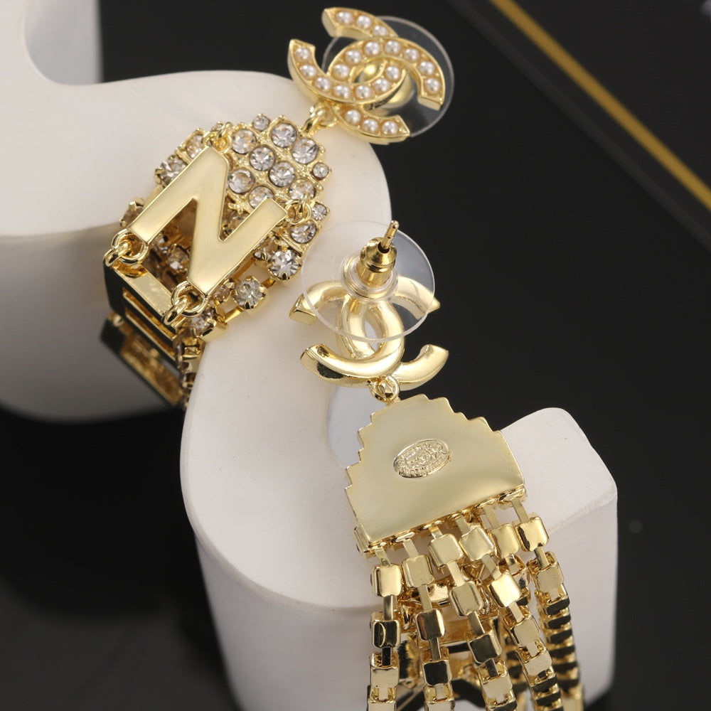 18K  Chanel Letter Earrings