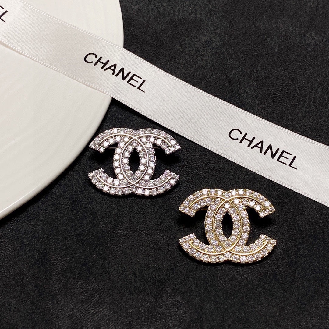 18K  Chanel Diamonds Set Broochs