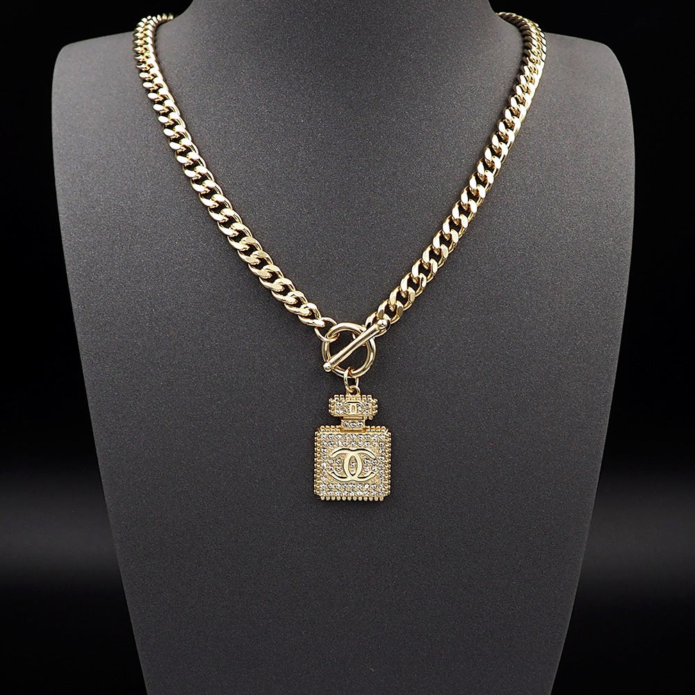 18K  Chanel Diamond Perfume Bottle Pendant Necklace